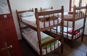 Casa Rosa de Peruíbe - Casa de Temporada 3 dormitórios, 10 hóspedes, piscina, wi-fi, netflix, 800 metros da praia - Photo 27