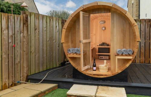 Designer Cotswold post house with external sauna - Foto 9