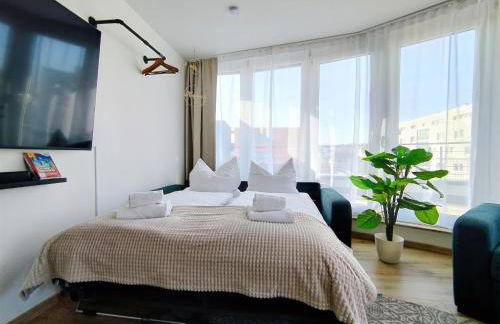 Ulmer Penthouse für 7, Arbeitsplatz, XXL-Dachterrasse, Grill, Wii - Foto 3