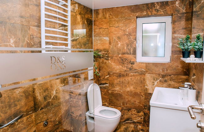 D & Sons Apartments - Photo 77