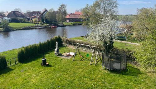 Weißes Apartmenthaus am Kanal - Foto 2