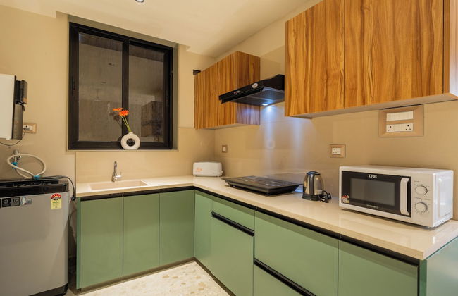 ELIVAAS Kamerios Verano 1 BHK with Pool - Photo 17