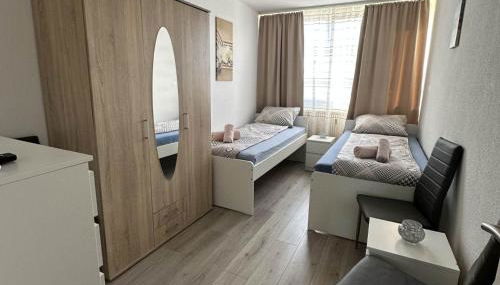 Modernes Apartment mit Balkon - Foto 3, wardrobe