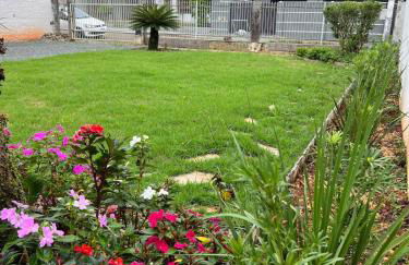 Casa Iririú · Casa exclusiva no terreno com jardim - Photo 2