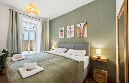 Gemütliches Apartment - hochwertiges Boxspringbett, privater Parkplatz, Terrasse, komplette Küche, WLAN, 40 Zoll HD TV - Foto 1