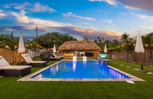 Bali Inspired home with Heated Pool, Sauna and Hot Tub! Close to Beach and Atlantic Ave - Photo 1