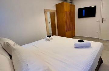 Nostos Suites Kamari - Foto 37