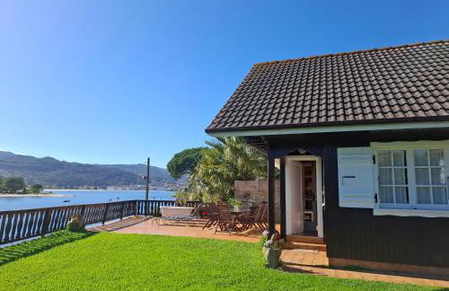 Casa de madera sobre el mar - Foto 2