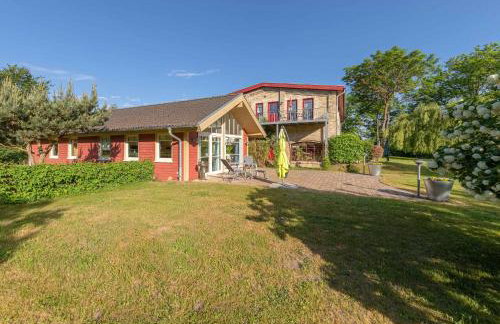 Wildgans - Stilvolles Ferienhaus mit Terrasse, Seeblick & Naturidylle am Loppiner See - Foto 11