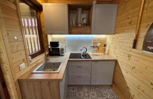 Domki przy jeziorze z prywatną plażą w Borach Tucholskich Pensjonat Alicja wczasy z dziećmi nowe luksusowe domki na skraju jeziora i lasu - Foto 35