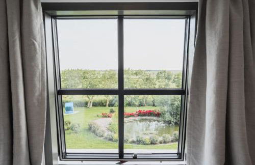 Rickmer's Hoff Reetdachhaus mit Sauna und Kamin - Foto 33