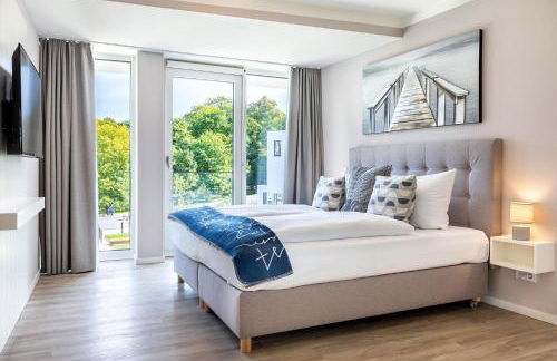 Godewindpark Deluxe-Suite 1-02 mit Ost-Loggia und schönem Gartenblick - Foto 29