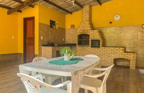 Casa com churrasqueira e piscina, perto de riacho - Foto 5