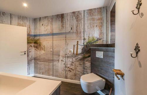 Modernes Holzhaus mit traumhaftem Deichblick - Foto 29