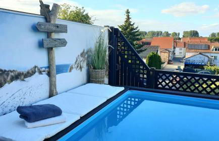 Kleines Apartement mit Dachterrasse und weitem Ausblick - Foto 12