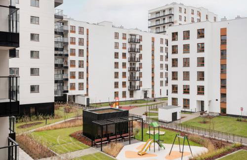 Apartamenty Krakowska Nowe budownictwo 2025r Strzeżone i zamknięte osiedle z ochroną Darmowy parking zewnętrzny Płatny parking podziemny Samodzielne zameldowanie Duży taras Blisko lotnisko im Chopina i centrum Warszawy - Foto 12