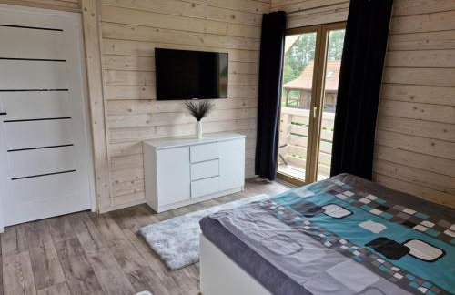 Najtaniej domki w Krutyni spływy kajakowe noclegi pokoje hotel pensjonat rezerwacje tylko telefonicznie 512-29O-43O prosimy nie sugerować się kalendarzem dostępności na tej stronie zapraszamy www domkiwkrutyni com - Foto 11