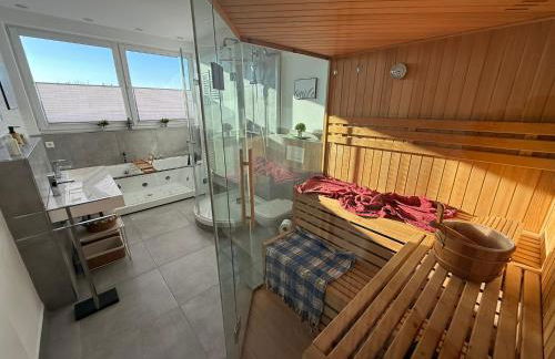 Penthouse mit Sauna, Jacuzzi & Tischkicker - Foto 2