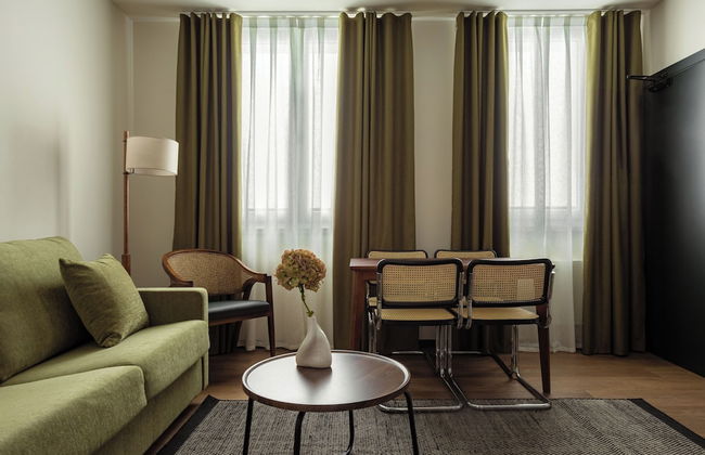 Batimont Suites & Apartments - Photo 21