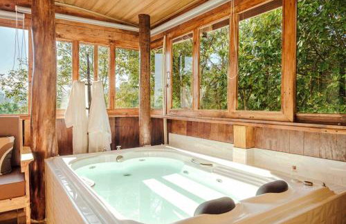 Chalé romântico com banheira aquecida - Foto 19