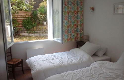 Appartement 3 chambres 6 pers rez de Jardin 5min plage quartier du Phare Location du dimanche au dimanche en juillet et aout - Photo 12