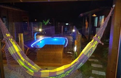 Chalés Praia do Rosa piscina compartilhada - Foto 65