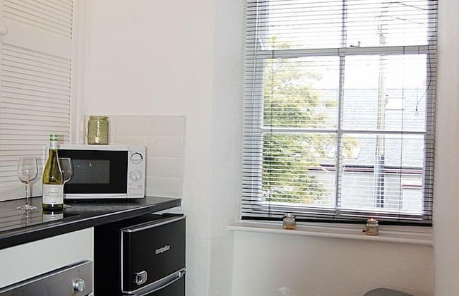 CLOCK TOWER APARTMENTS - Photo 21