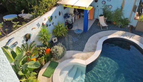 Appartement avec piscine et jacuzzi à 50mètres de la plage et 5min de l'allée des Pins - Photo 2, Garden view