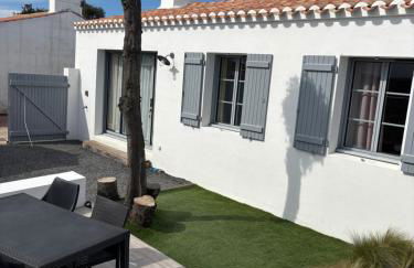 Les pieds dans le sable - Foto 2