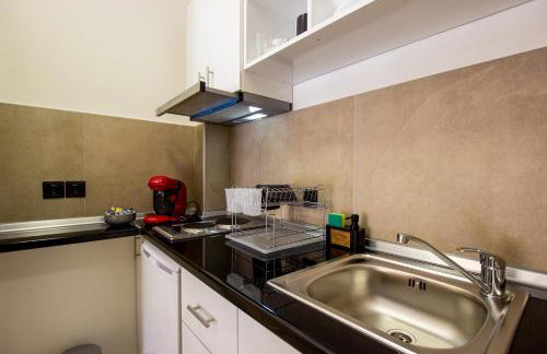 KyMa Studios and Suites - Photo 58