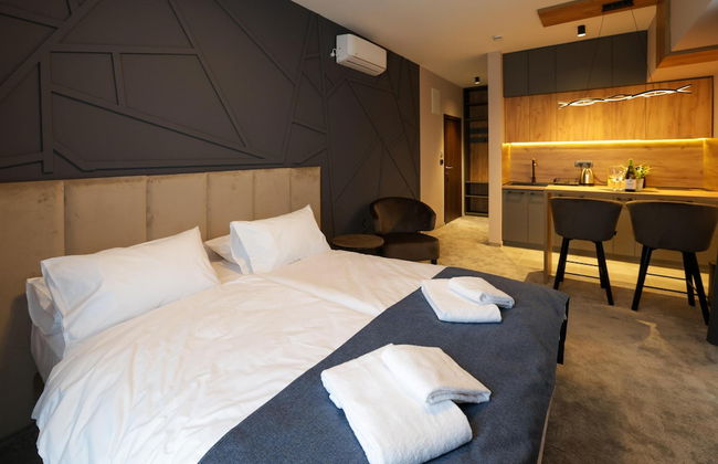 Nest Suites - Photo 11