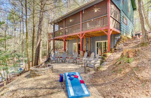 Secluded Cherry Log Cabin with Hot Tub and Swings! - Photo 1