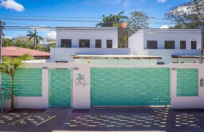 Ultramodern Townhome with an Inviting Coastal Design and Lush Outdoor Oasis with a Private Pool - Photo 37