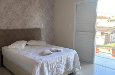 Sobrado top com piscina, espaço gourmet, próximo à praia com Ar Condicionado - Foto 12