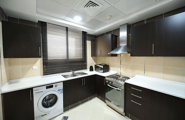 Al Waleed Holiday Homes - Photo 9