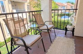 Poolside 2BR Condo with Balcony & Workspace - Photo 42