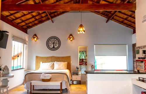 Chalé Canto do Galo 1 - Hidro da Jacuzzi, Lareira Ecológica, Cozinha Completa, Wi-Fi 80mbps, próximo a comércio local e relaxando ao som do riacho - Photo 19