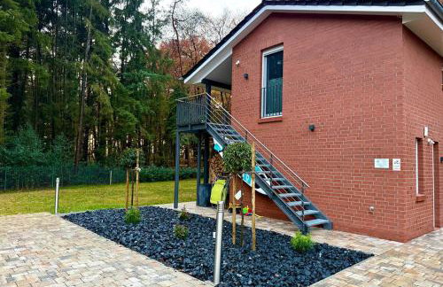 Modernes Ferienhaus am See mit Garten - Photo 40