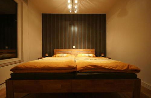 Ferienhaus direkt am See - Kamin, Klima, Sauna und Boot - Foto 30