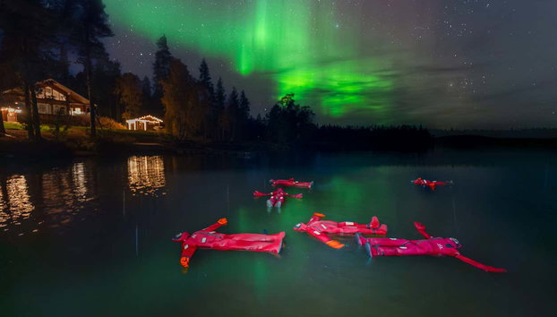 Northern Lights Ice Floating Experience - Photo 4, Float on your back as you watch the floating lights