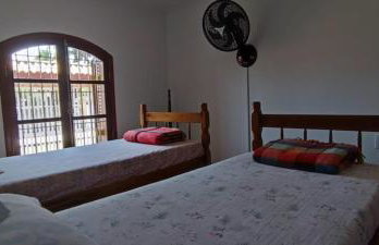 Casa Rosa de Peruíbe - Casa de Temporada 3 dormitórios, 10 hóspedes, piscina, wi-fi, netflix, 800 metros da praia - Photo 26