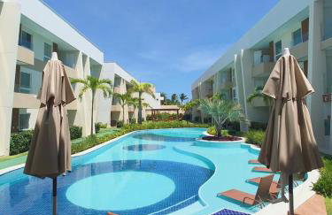 Guarajuba Porto Smeralda Village C02, térreo - GUARAJUBA TEMPORADA, viva mais de uma experiência de hospedagem conosco! 130m da praia - Foto 2