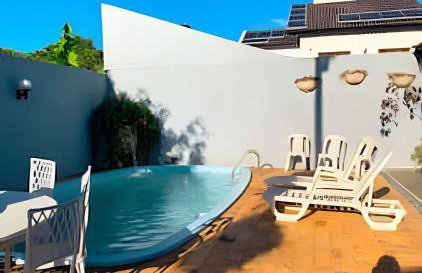 Casa com 2 suites e 1quarto piscina Ar para 8 hospedes - Foto 107