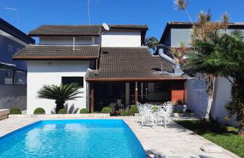 Lindo Sobrado com Piscina em Condomínio Fechado - Photo 1