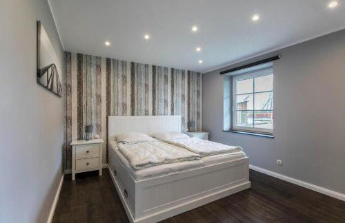 Modernes Holzhaus mit traumhaftem Deichblick - Foto 21