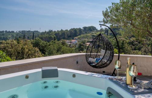 Uniquely designed Villa Ivana with outdoor Jacuzzi nearby the pebble Banje beach at the Island of Solta - Photo 53