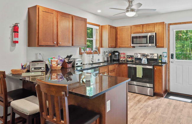 Maple Oasis by Avantstay Newly Built w/ Hot Tub, Game Room & Fire Pit - Photo 8