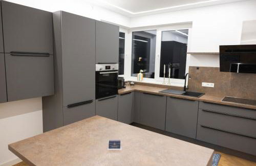 Neubau Apartment mit Kamin und Terrasse in Premium Lage Parkplatz inklusive - Foto 7