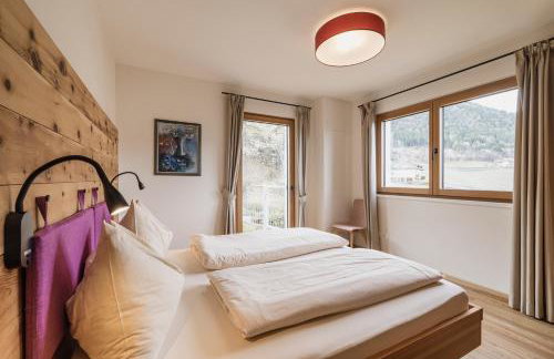 Felsenegg appartements - moderne Wohnungen im Luftkurort mit traumhaftem Garten Nähe Meran für Paare und Familien - Foto 54