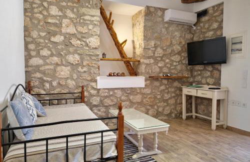 Alekos Cozy Stone 2BR Home Karya Center - Photo 4